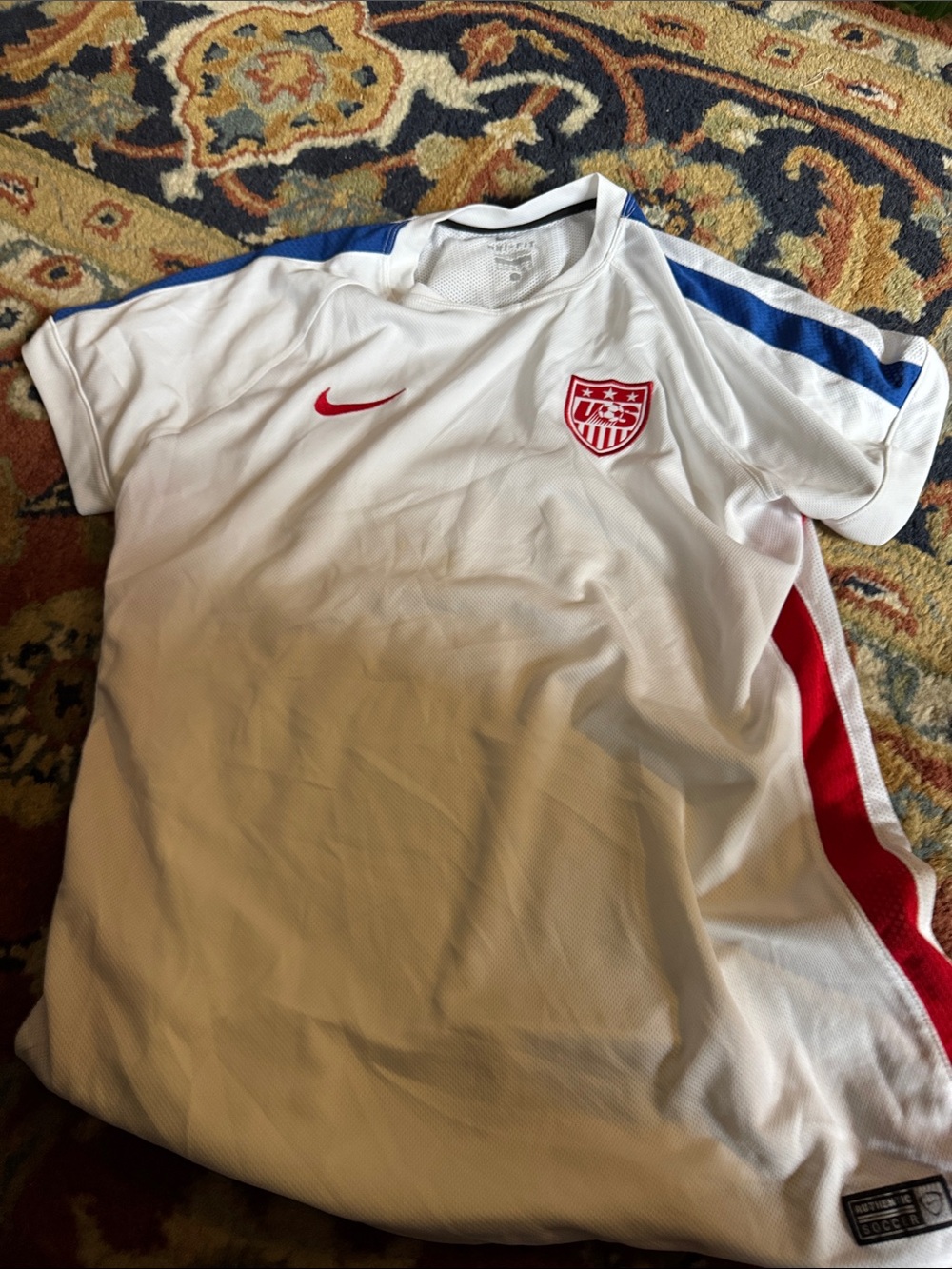Nike women’s White Soccer Jersey with Red & Blue Accents